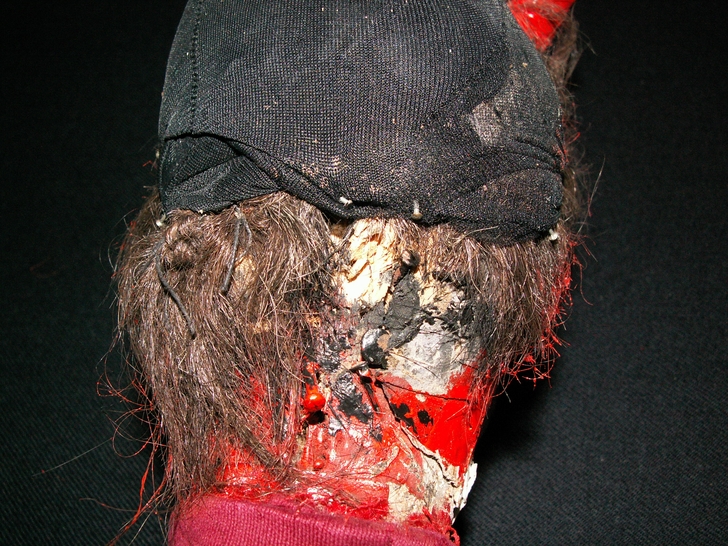 Particolare della testa prima del restauro